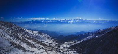 Partial mobile screen showing UI icons and profile area.