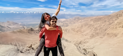 Blurred close-up of colorful pebbles and textured ground.