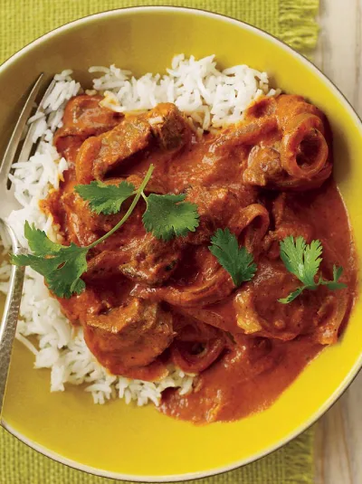 Rogan Josh
Mutton simmered in Kashmiri chilli and ratanjot — deep red, gently hot, thickened with yoghurt rather than tomato.